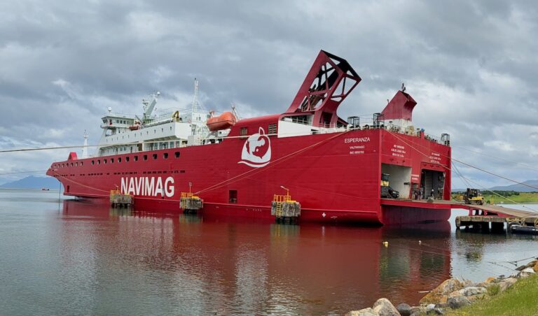 Red Navimag cargo ferry Esperanza docked at the harbour in Puerto Natales, Chile